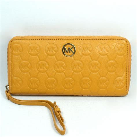 michael kors za continental genuine leather wallet navy gold|Michael Kors monogram wallet.